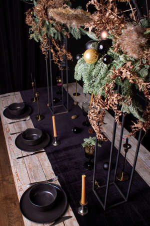 Modern design Christmas tree decorated with balls and garlands. Winter holidays composition.の写真素材