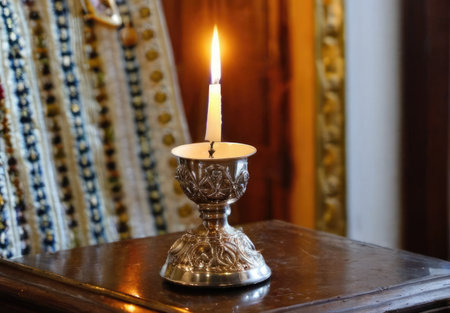 Burning candle in a candlestick in the Orthodox Church. World day religionの素材