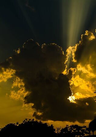 sunrise sun behind clouds, a beautiful natural viewの写真素材