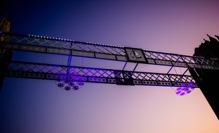 Artificial river bridge covered in lights in diwali fair