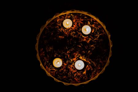 Happy Diwali - rangoli painting on floor for diwali with floating candlesの写真素材