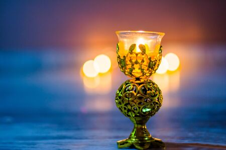 Happy Diwali - Colorful clay diya lamps lit during diwali celebrationの写真素材