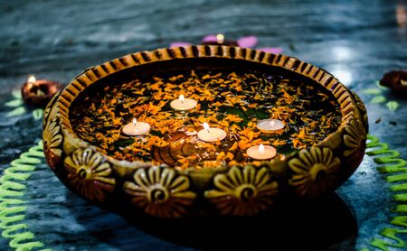 Happy Diwali - Colorful clay diya lamps lit during diwali celebrationの写真素材