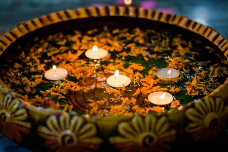 Happy Diwali - Colorful clay diya lamps lit during diwali celebrationの写真素材