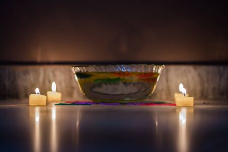 Happy Diwali - Colorful clay diya lamps lit during diwali celebrationの写真素材