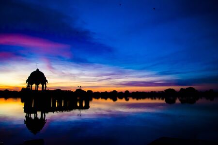 Gadsisar Sagar Lake in Jaisalmer Rajasthan, Sunrise at Gadsisar Sagar Lakeの写真素材