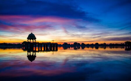 Gadsisar Sagar Lake in Jaisalmer Rajasthan, Sunrise at Gadsisar Sagar Lakeの写真素材