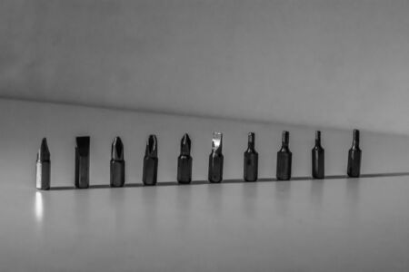 Different types of screw bits of screwdriver isolated on white background.の写真素材