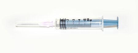 Medical syringe isolated on a white backgroundの写真素材