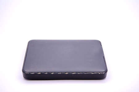 HDD - Grey Portable External Hard Disk Drive isolated on white background. External hard disk drives.の写真素材