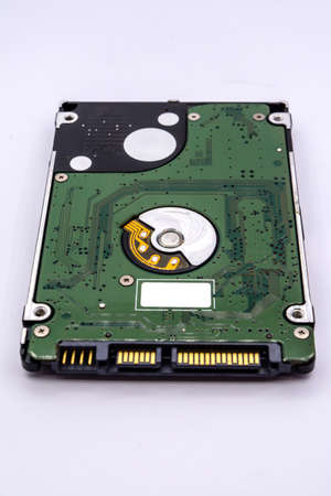 Close up of internal hard disk drive or hdd of Laptop isolated on white background.の写真素材