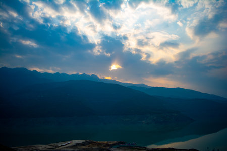 Sunrise view of Tehri mountains. Scenery sunrise over Tehri Lake, Uttarakhand. Tehri Dam, the tallest dam in India and Tehri dam is Asia's largest man-made lake.の写真素材