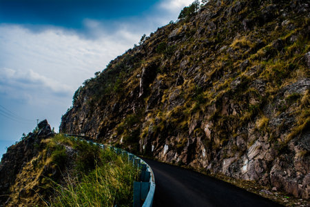 Beautiful  curvy Road on the mountains of Lansdowne, Uttarakhand. Aerial view of amazing curved road through the mountains.の写真素材