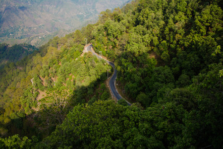 Beautiful  curvy Road on the mountains of Lansdowne, Uttarakhand. Aerial view of amazing curved road through the mountains.の写真素材