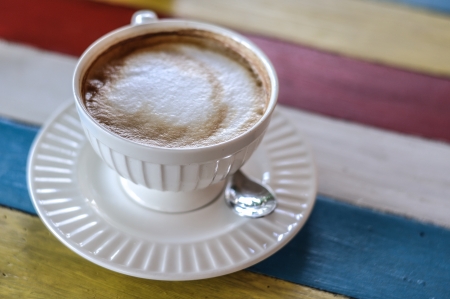 A cup of coffee with Milk foam.の写真素材