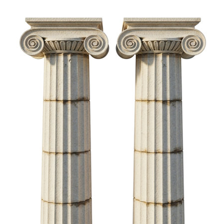 A pair of classical ionic columns, showcasing their distinctive volutes and vertical fluting, standing tall against a clean white backdrop.の素材