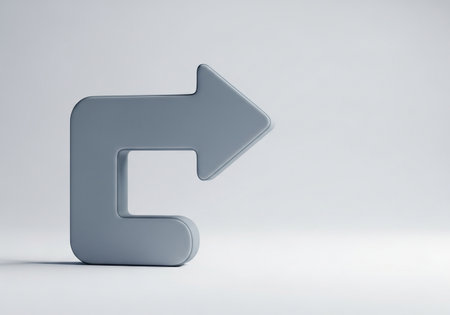 A sleek, grey 3D arrow icon gracefully curves to the right, symbolizing direction and forward movement on a clean white surface.の素材