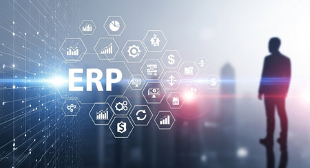 This image represents the concept of ERP system implementation, showcasing a businessman interacting with a virtual interface displaying business-related icons and ERP.の素材