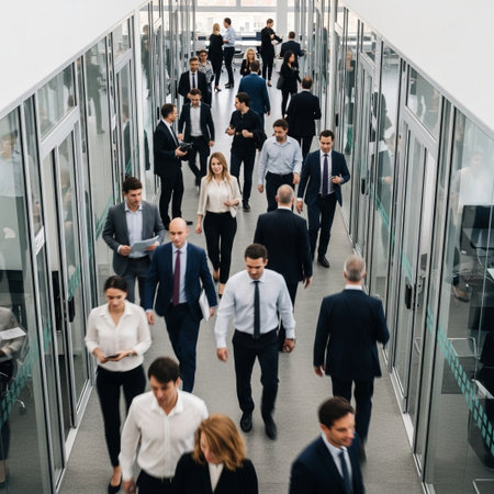 Diverse business professionals walk purposefully through a modern office hallway, showcasing a dynamic corporate environment. This image symbolizes progress, collaboration, and teamwork.の素材