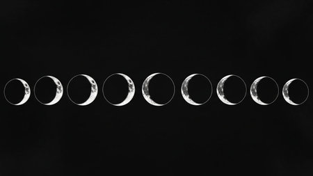 A horizontal line of crescent moon phases, transitioning from sliver to near full, against a stark black background.の素材