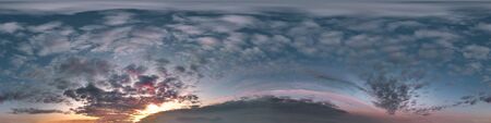 dark blue sky before sunset with beautiful awesome clouds. Seamless hdri panorama 360 degrees angle view with zenith for use in graphics or game development as sky dome or edit drone shotの写真素材