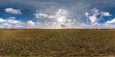 full seamless spherical panorama 360 degrees angle view on among fields in spring day with awesome...