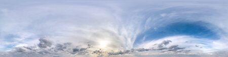 Seamless panorama 360 degrees angle view blue sky with beautiful fluffy cumulus clouds with zenith for use in 3d graphics or game development as sky dome or edit drone shotの写真素材
