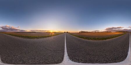 Full spherical seamless hdri panorama 360 degrees angle view on no traffic asphalt road among fields...