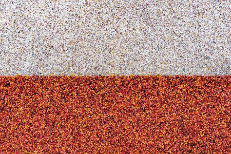 Close up surface of texture of small stone or sand wall backgroundの写真素材