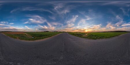 Full spherical seamless panorama 360 degrees angle view on old no traffic asphalt road among fields...