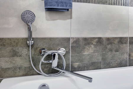 Ceramic Water tap sink with faucet with soap and shampoo dispensers in expensive loft bathroom or...