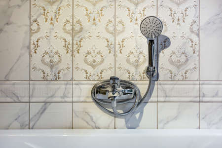 Ceramic Water tap sink with faucet with soap and shampoo dispensers in expensive loft bathroom or...