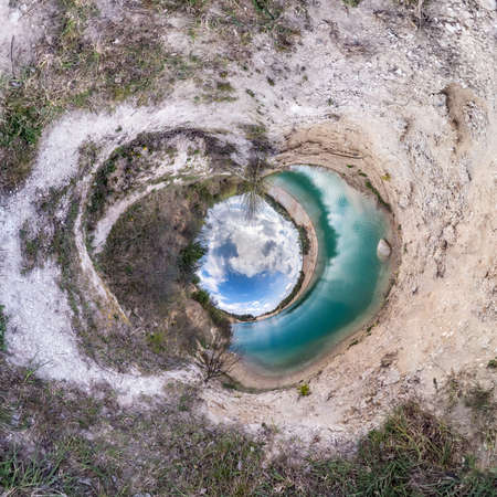 Blue little planet. Inversion of tiny planet transformation of spherical panorama 360 degrees. Spherical abstract aerial view. Curvature of space.の写真素材