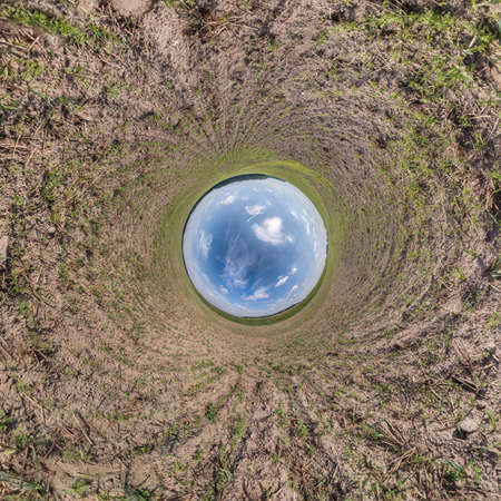 Blue little planet. Inversion of tiny planet transformation of spherical panorama 360 degrees. Spherical abstract aerial view. Curvature of space.の写真素材