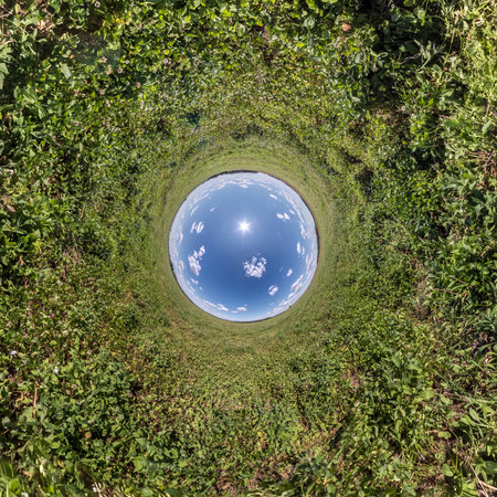Blue little planet. Inversion of tiny planet transformation of spherical panorama 360 degrees. Spherical abstract aerial view. Curvature of space.の写真素材