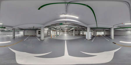 Full  spherical hdri panorama 360 degrees in empty underground garage parking with columns and road markings in equirectangular projection,  VR contentの写真素材