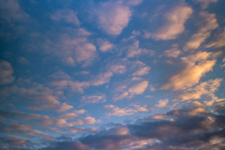 Blue sky background with big evening striped clouds. blue sky panorama may use for sky replacement