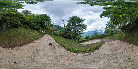 360 hdri panorama on serpentine path in high in mountains among deciduous forest in equirectangular...