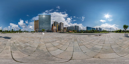 360 seamless hdri panorama view on square near seashore or ocean with skyscrapers with blue sky and good weather in equirectangular spherical projection, ready AR VR virtual reality contentの写真素材