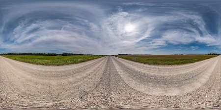 360 hdri panorama on no traffic white sand gravel road among fields with sky with some clouds  and halo in equirectangular spherical projection, VR AR content.  seamlessの写真素材