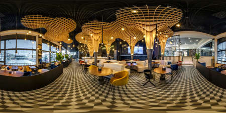 MOSCOW, RUSSIA - NOVEMBER, 2021: spherical seamless hdr 360 panorama in interior of banquet hall with appliances in luxury restaurant with intimate lightingin equirectangular projection. VR contentのeditorial素材