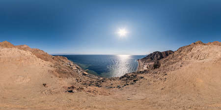 panorama view from the height of the mountains range  to the blue seaの写真素材