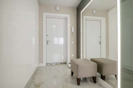 long empty corridor in interior of entrance hall of modern apartments, office or clinicの写真素材