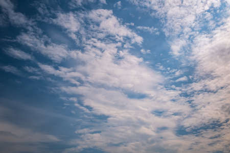 Blue sky background with white striped clouds in heaven and infinity. blue sky panorama may use for sky replacement.の写真素材