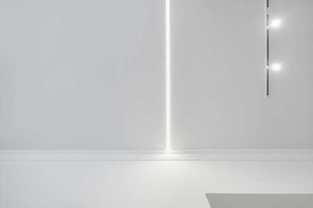 suspended ceiling with halogen spots lamps and drywall construction in empty room in apartment or house. Stretch ceiling white and complex shape.の写真素材