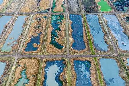 aerial view of abandoned biological ponds and water treatment plantの写真素材