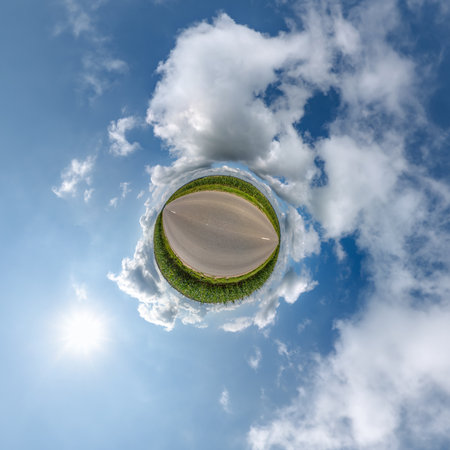 simple little tiny planet in blue sky with beautiful clouds. Transformation of spherical panorama...