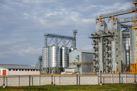 agro-processing and manufacturing plant for processing and silver silos for drying cleaning and storage of agricultural products, flour, cereals and grain. Granary elevatorの写真素材