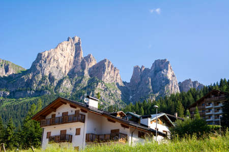 View of Santa Fosca village and Dolomites in summer, Province of Belluno, Italy