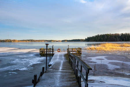Wooden pier on the shore and view to The Gulf of Finland, Majvik, Kirkkonummi, Finlandの写真素材